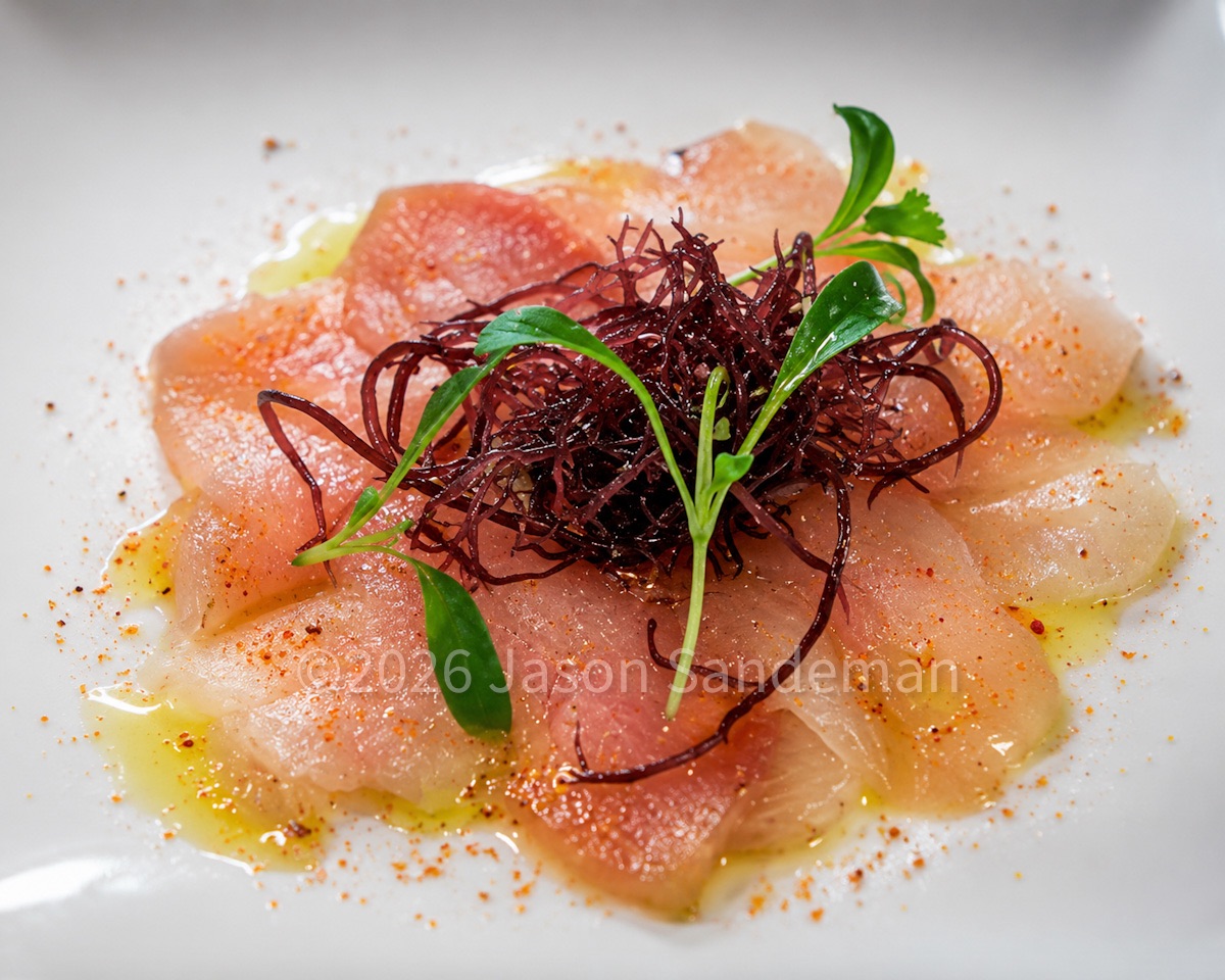 Albacore and Hamachi sashimi with togarashi, wasabi oil, dried wakame with micro coriander